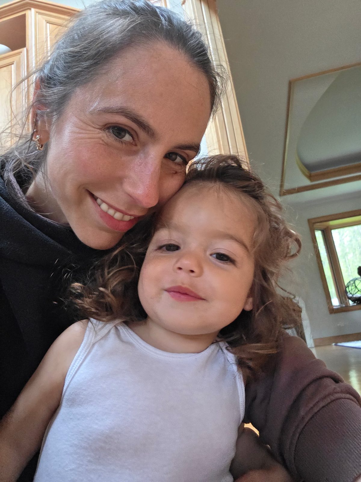 Lauren and Mila cheek to cheek