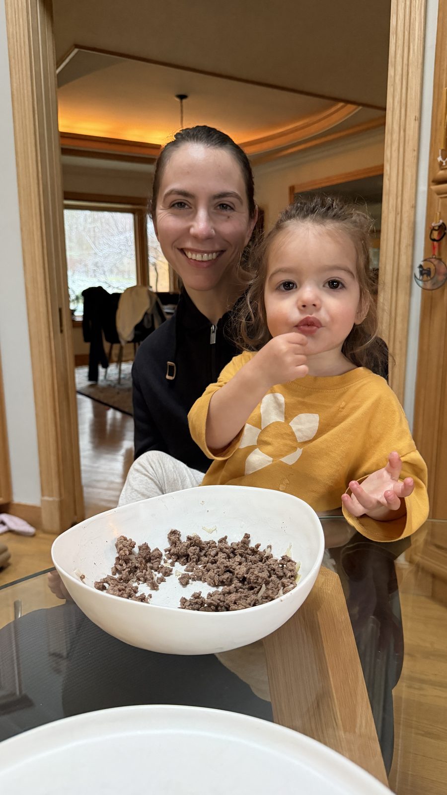 Lauren cooking with Mila